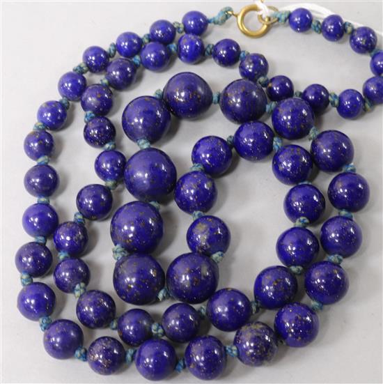 A graduated lapis lazuli bead necklace, 27in.